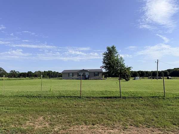 20.1 Acres of Recreational Land with Home for Sale in Wyandotte, Oklahoma