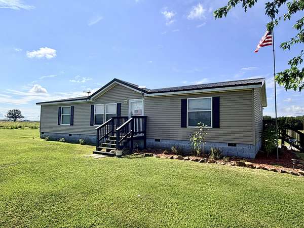 20.1 Acres of Recreational Land with Home for Sale in Wyandotte, Oklahoma