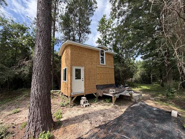 3 Acres of Land with Home for Sale in Carthage, Texas