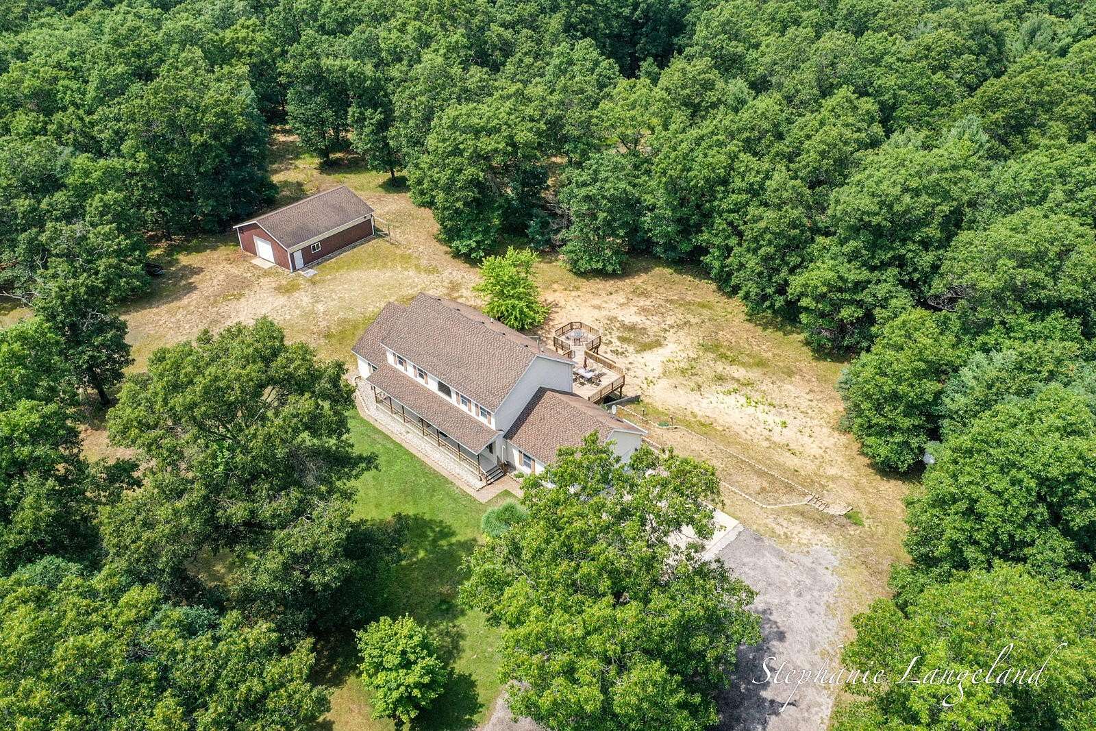 10.5 Acres of Recreational Land with Home for Sale in Whitehall, Michigan