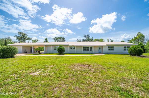 2.75 Acres of Land with Home for Sale in Lynn Haven, Florida