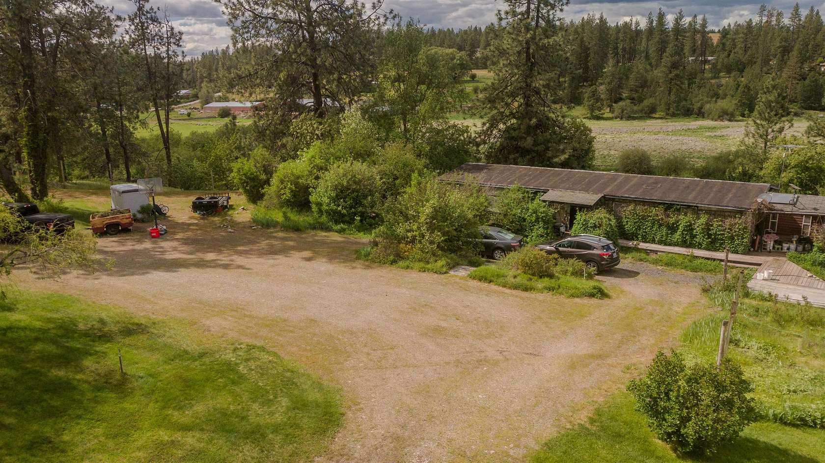 9.73 Acres of Land with Home for Sale in Chattaroy, Washington