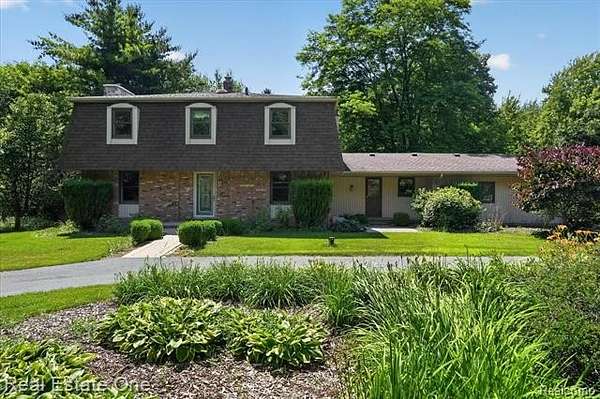 6.6 Acres of Land with Home for Sale in Highland Township, Michigan