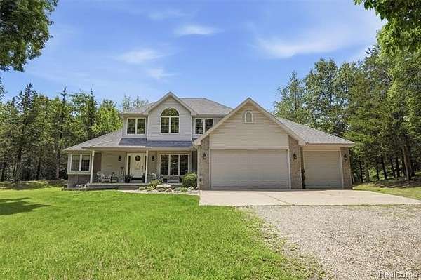 63.7 Acres of Recreational Land with Home for Sale in Norvell Township, Michigan