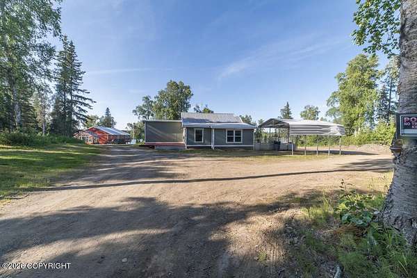 1.73 Acres of Land with Home for Sale in Nikiski, Alaska