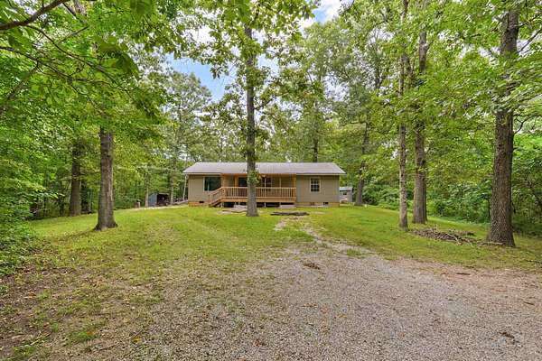 10 Acres of Land with Home for Sale in Crane, Missouri