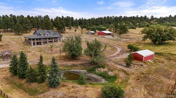 50 Acres of Land with Home for Sale in Larkspur, Colorado