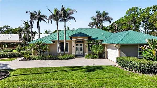 11.7 Acres of Land with Home for Sale in Palm City, Florida