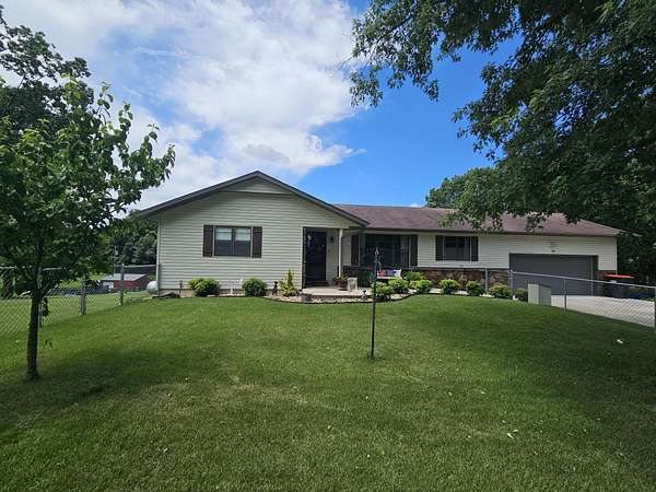 1.6 Acres of Land with Home for Sale in Pineville, Missouri
