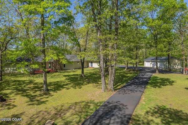 37.5 Acres of Recreational Land with Home for Sale in Joplin, Missouri