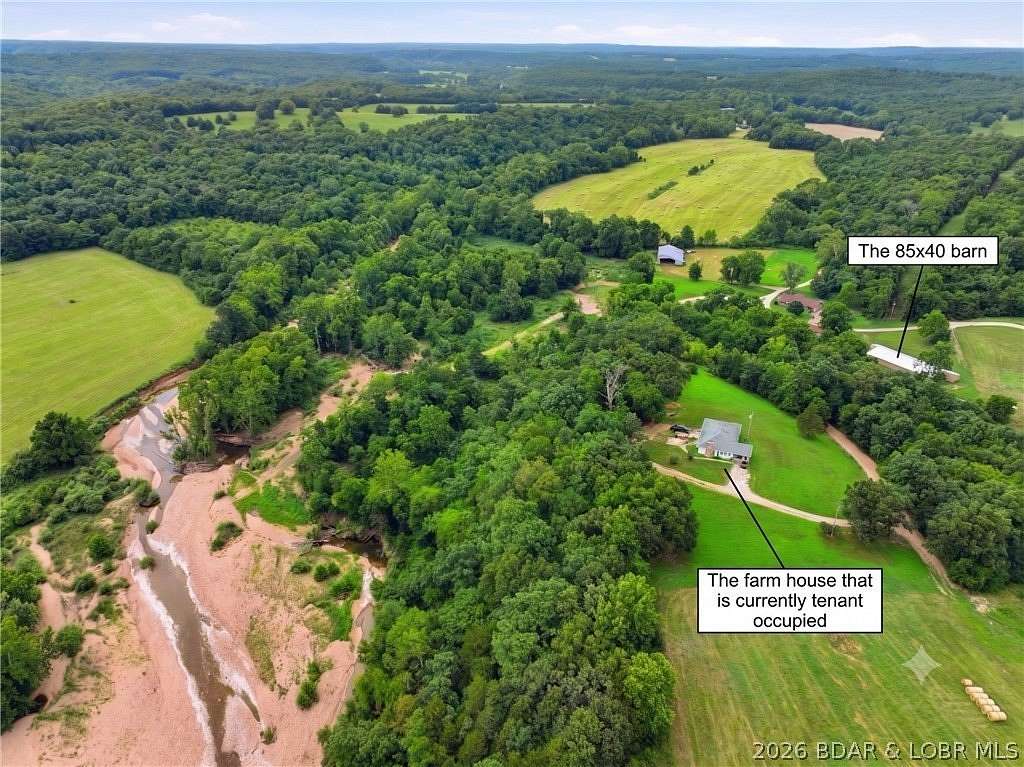 500 Acres of Land with Home for Sale in Brumley, Missouri