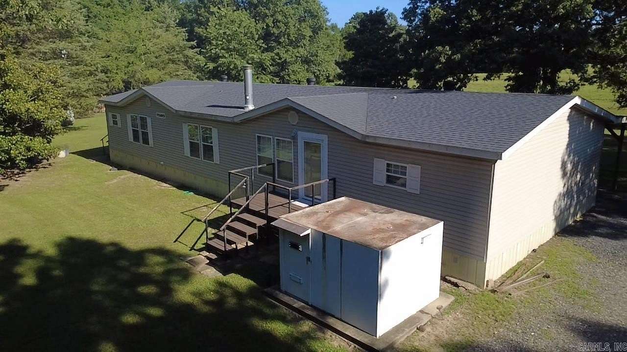 121 Acres of Land with Home for Sale in Mena, Arkansas