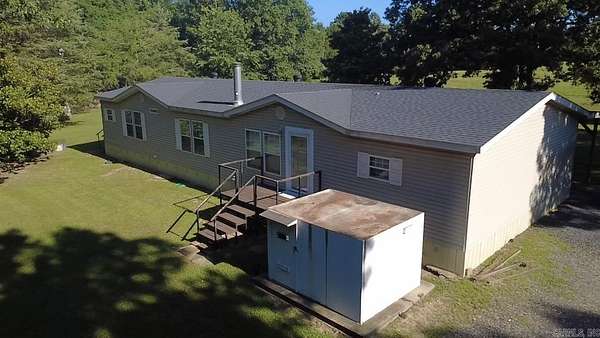 121 Acres of Land with Home for Sale in Mena, Arkansas