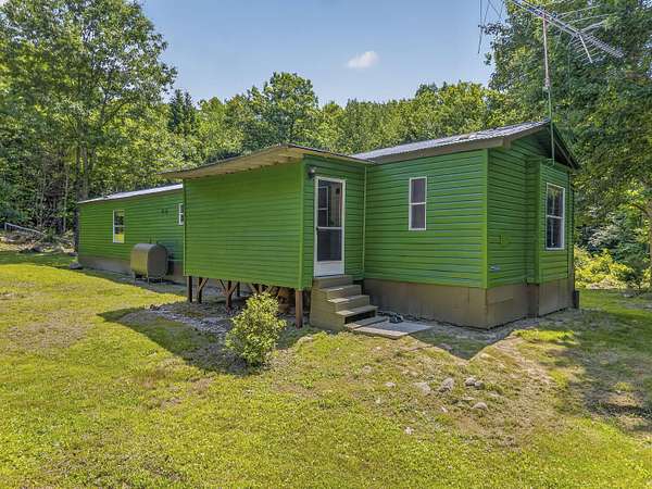 41.5 Acres of Recreational Land with Home for Sale in Livermore Falls, Maine