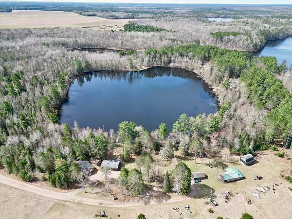 54 Acres of Land with Home for Sale in Eagle River, Wisconsin