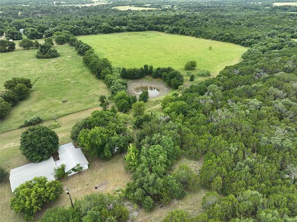 17.3 Acres of Land with Home for Sale in Iredell, Texas