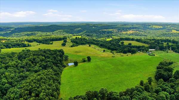 296 Acres of Agricultural Land with Home for Sale in Ava, Missouri