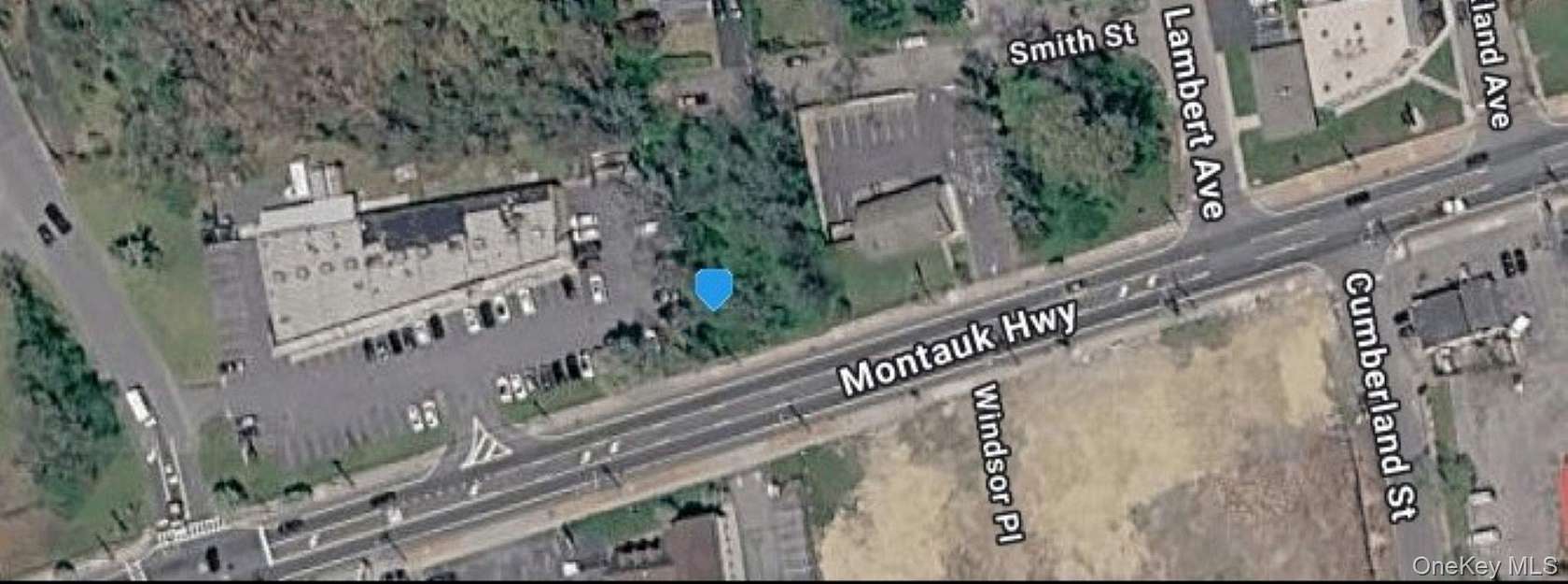 0.32 Acres of Mixed-Use Land for Sale in Mastic, New York
