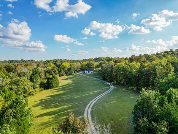 32 Acres of Land with Home for Sale in Columbia, Tennessee
