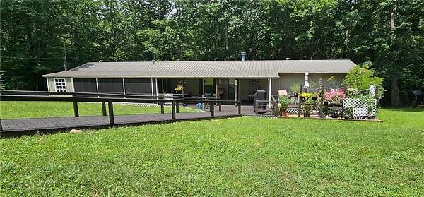 3.83 Acres of Land with Home for Sale in Menlo, Georgia