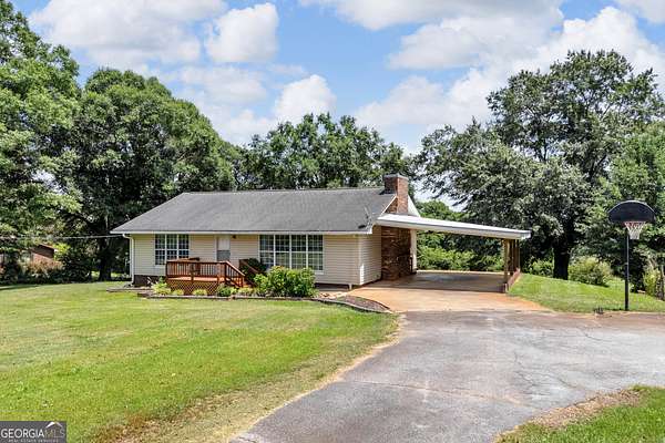 1.5 Acres of Land with Home for Sale in Carnesville, Georgia