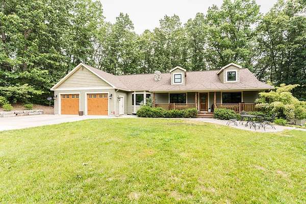 3.69 Acres of Land with Home for Sale in Comstock Park, Michigan