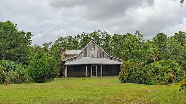 6.49 Acres of Land with Home for Sale in Eastpoint, Florida
