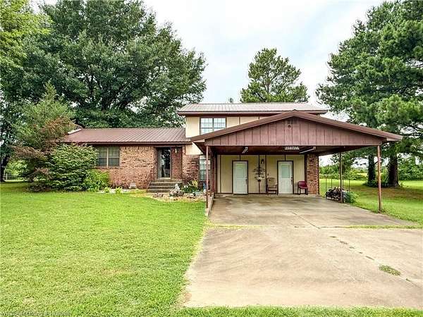 2.5 Acres of Land with Home for Sale in Muldrow, Oklahoma