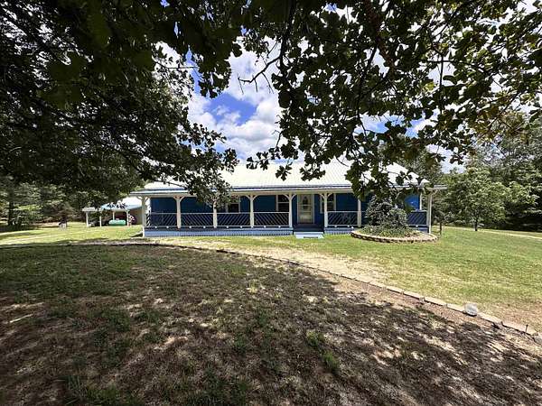 49 Acres of Recreational Land with Home for Sale in Violet Hill, Arkansas