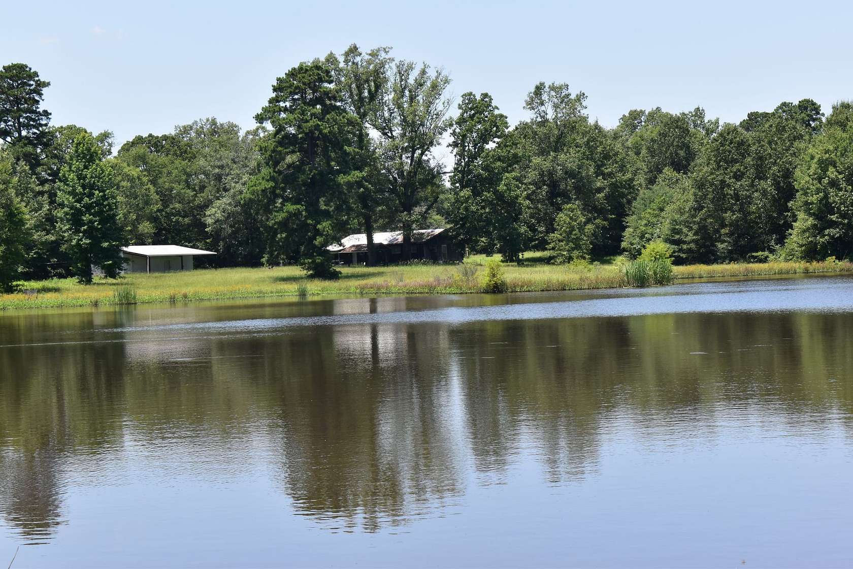 48.8 Acres of Recreational Land with Home for Sale in Ogden, Arkansas
