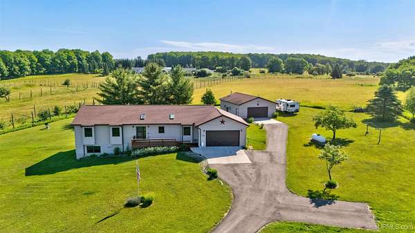 9 Acres of Land with Home for Sale in McMillan, Michigan