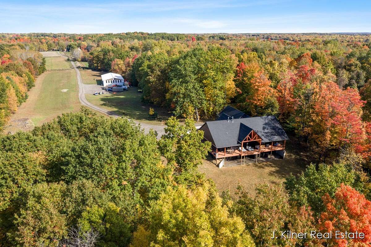 34 Acres of Land with Home for Sale in Grant, Michigan