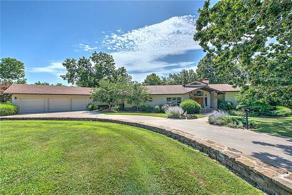 31.3 Acres of Land with Home for Sale in Rogers, Arkansas