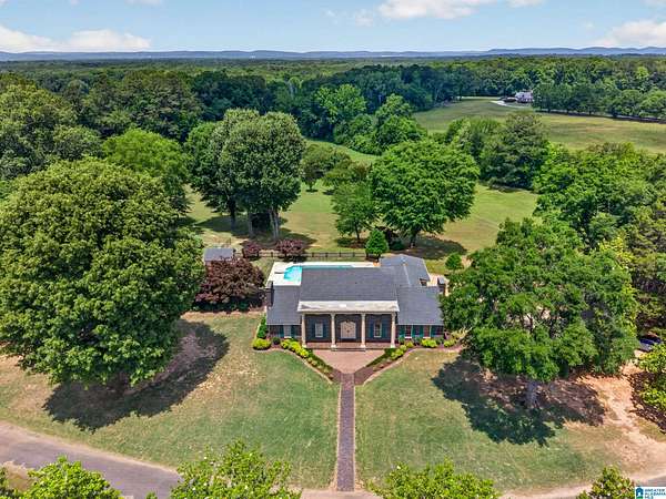 21 Acres of Agricultural Land with Home for Sale in Rainbow City, Alabama