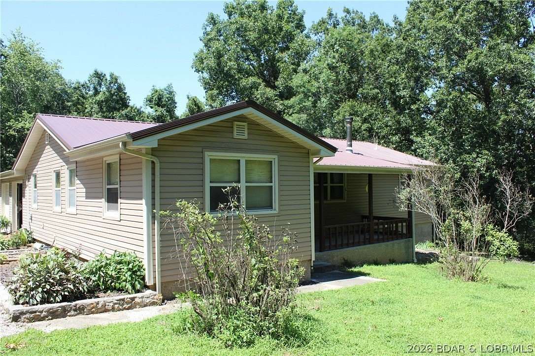 31.8 Acres of Recreational Land with Home for Sale in Gravois Mills, Missouri