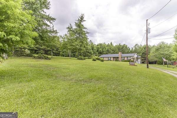 3.27 Acres of Land with Home for Sale in Lizella, Georgia
