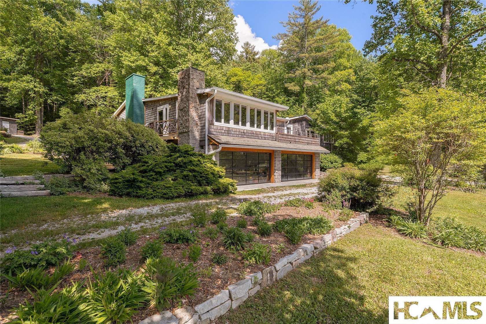 38 Acres of Land with Home for Sale in Sapphire, North Carolina