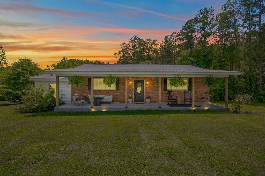 9.84 Acres of Land with Home for Sale in Kinards, South Carolina