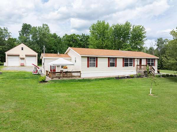 3.6 Acres of Land with Home for Sale in Corinna, Maine