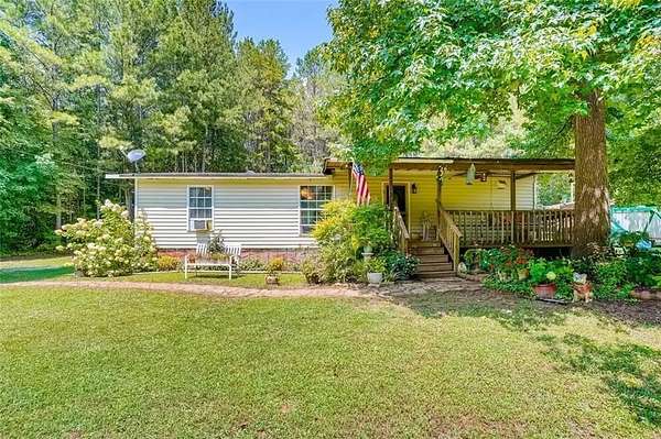 5.39 Acres of Land with Home for Sale in Canton, Georgia
