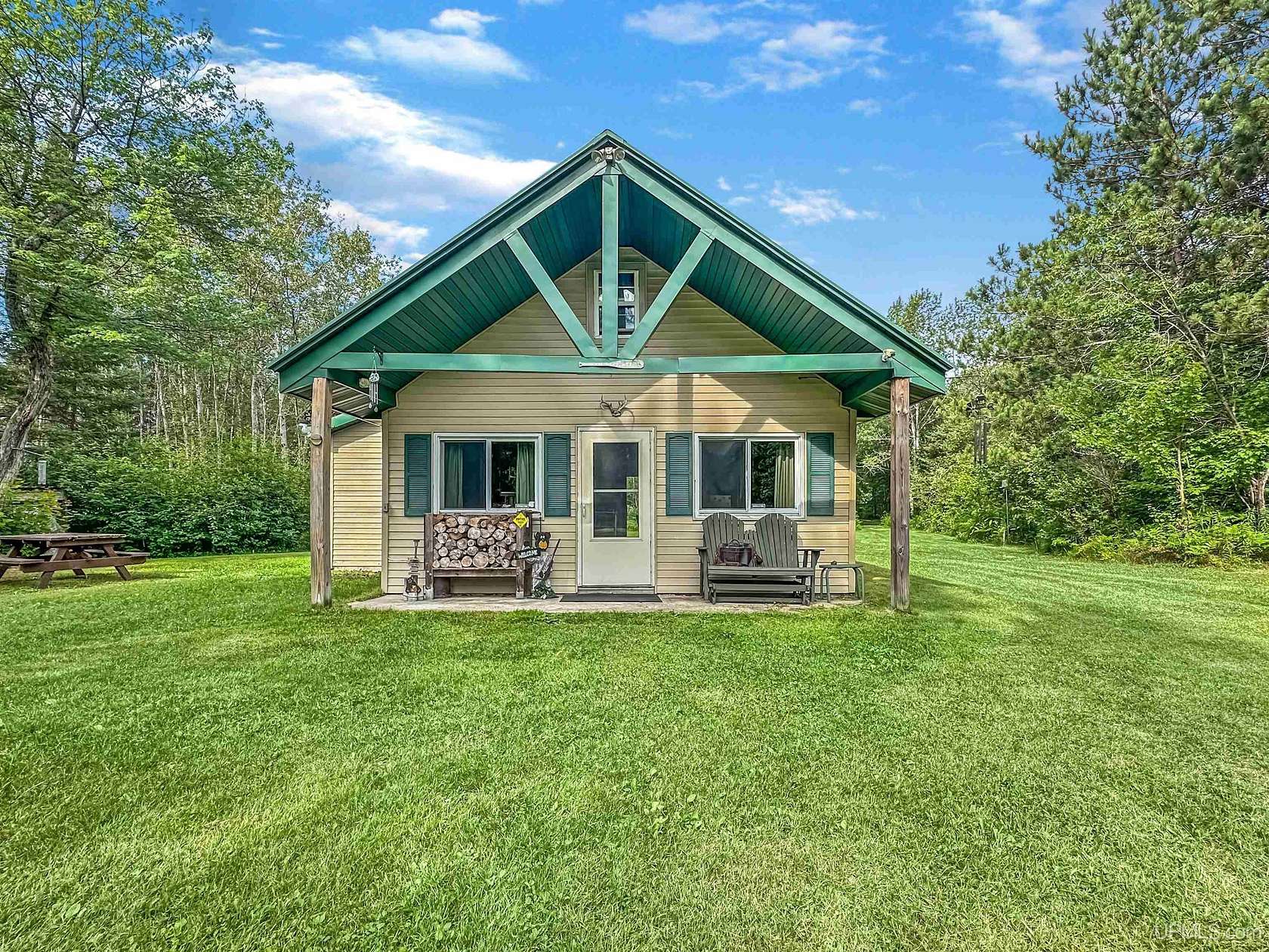 11 Acres of Recreational Land with Home for Sale in Rapid River, Michigan