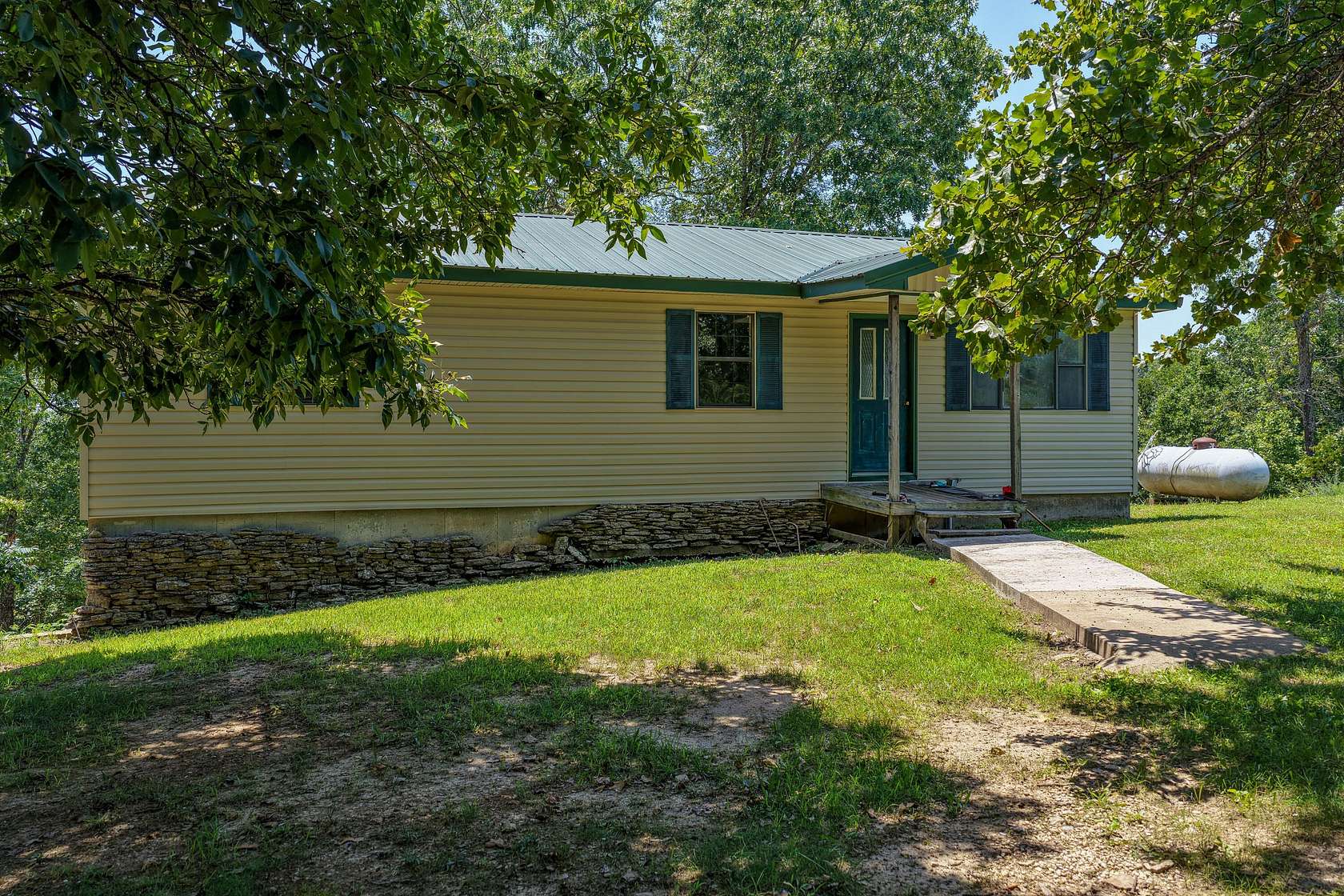 5 Acres of Land with Home for Sale in Mansfield, Missouri