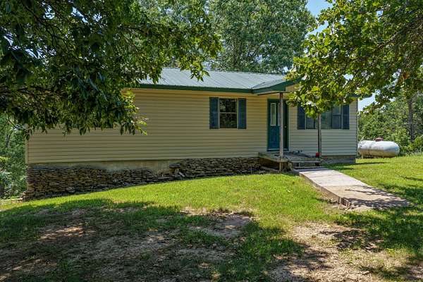 5 Acres of Land with Home for Sale in Mansfield, Missouri