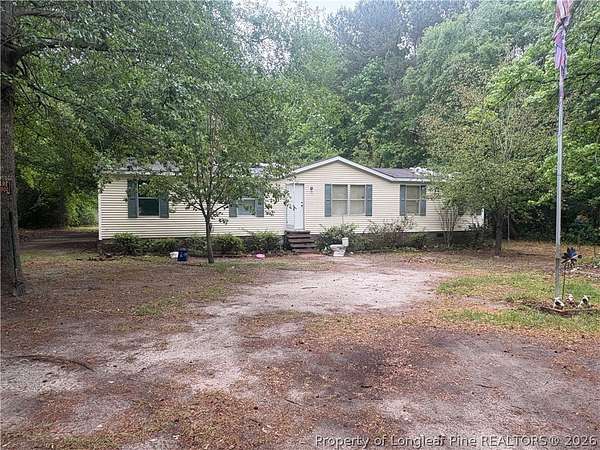 1.5 Acres of Land with Home for Sale in Hope Mills, North Carolina