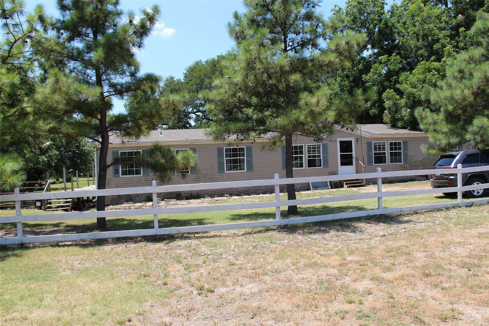 17.4 Acres of Land with Home for Sale in Savoy, Texas