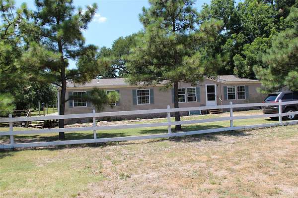 17.4 Acres of Land with Home for Sale in Savoy, Texas