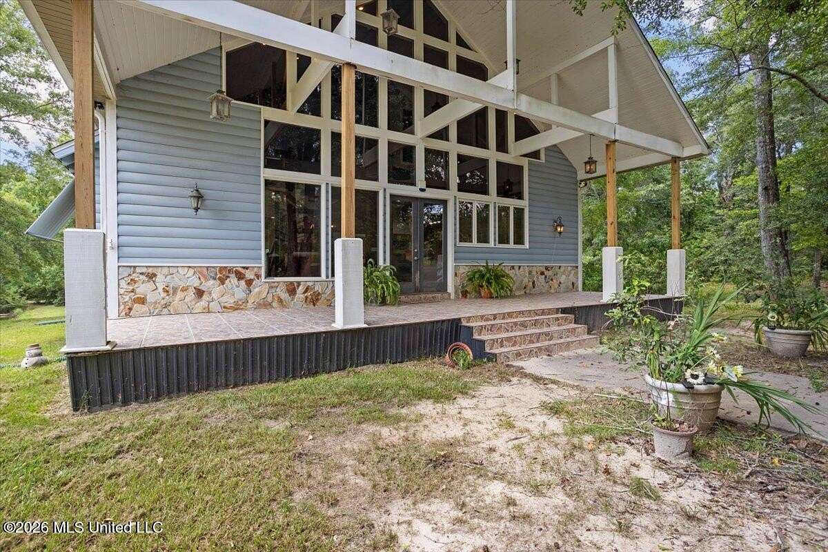 4.4 Acres of Land with Home for Sale in Wiggins, Mississippi