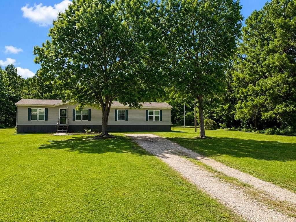 1.87 Acres of Land with Home for Sale in Proctor, Arkansas