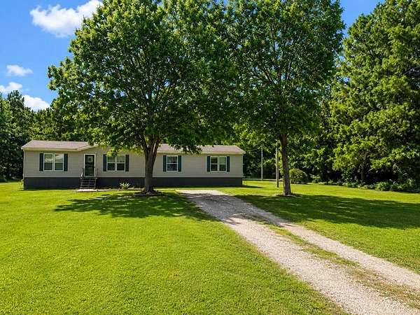 1.87 Acres of Land with Home for Sale in Proctor, Arkansas