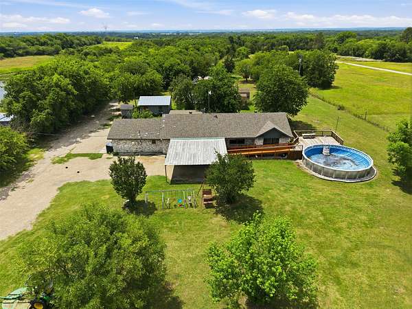 7.27 Acres of Land with Home for Lease in Maypearl, Texas